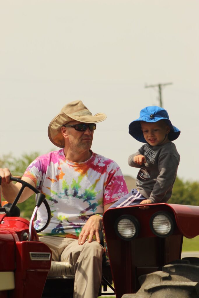Tim and Willem Stoub working on the tractor at Stoub Family Farms